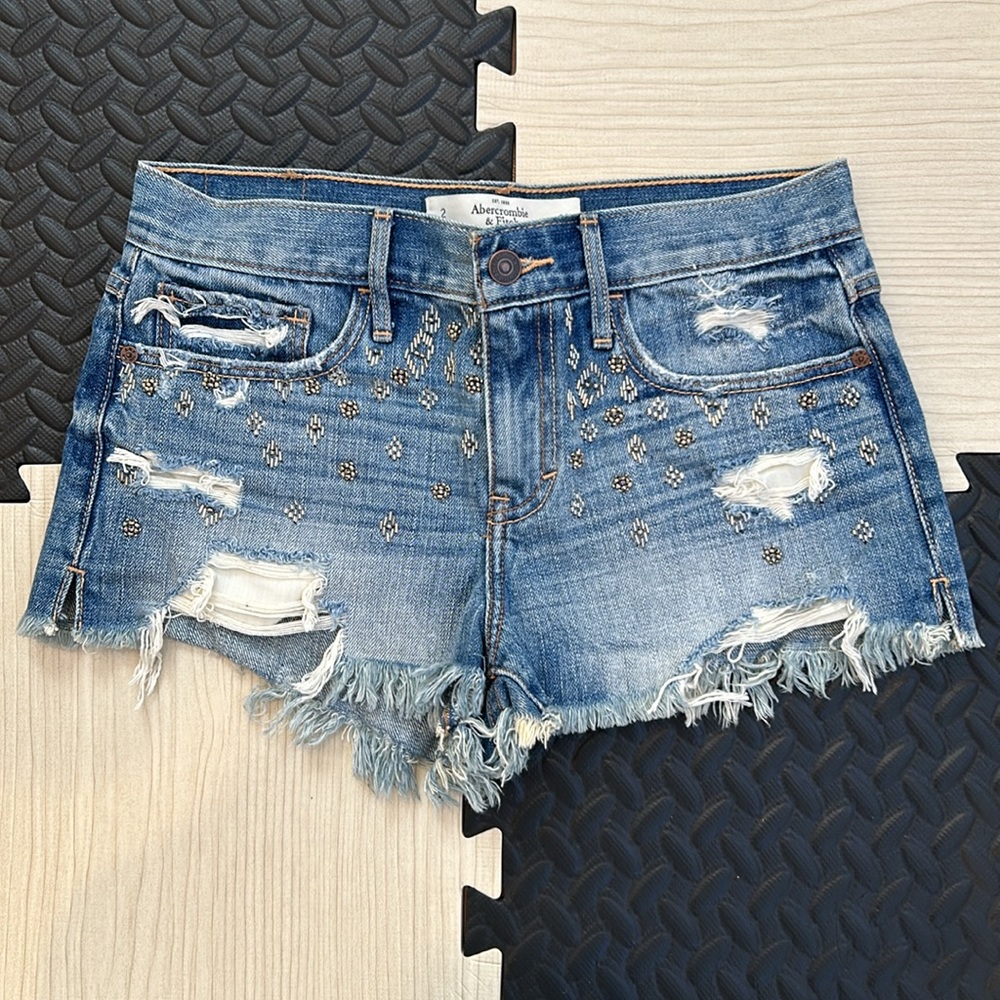 Abercrombie and Fitch denim shorts with gold and silver detailing size 2/W 26